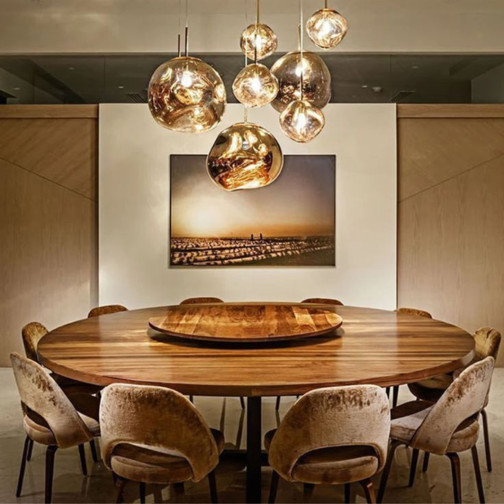 Banquette Dining Area with ceiling lamp and a wallpaint