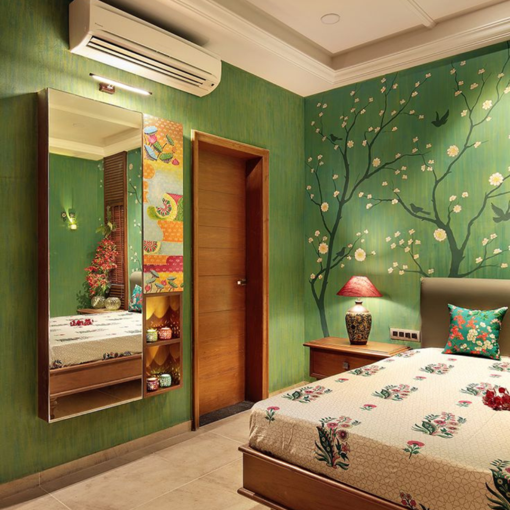 Wallpaper of a house's bedroom with a bed, ac, and table lamp and a bedside table